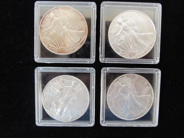 lot 195 image: Group of 4 - One Ounce Fine Silver US Liberty One Dollar Coins