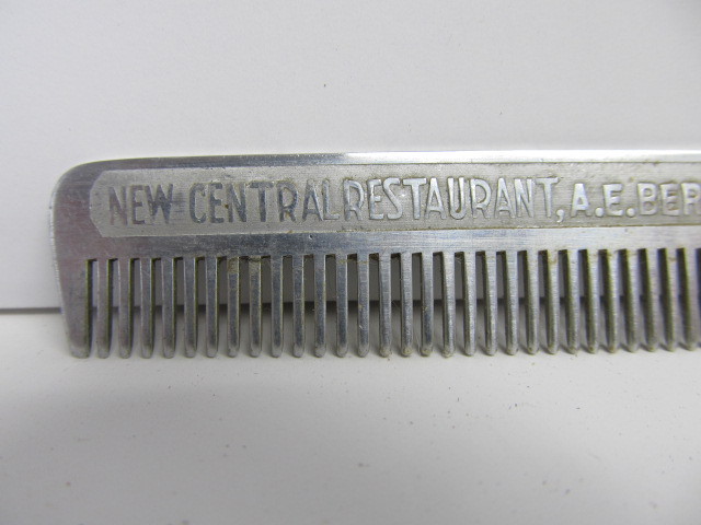 lot 261 image: Antique Metal Advertising Saw Comb from Slayton, Minnesota