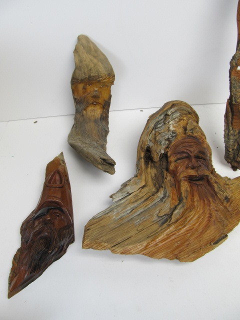 lot 311 image: Group of Wooden Tree BarkDriftwood Face etc Carvings