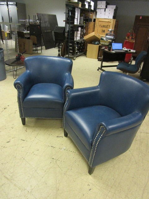 lot 404 image: TWO VINYL ARMCHAIRS