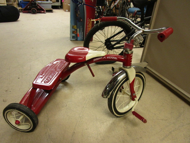 retro red radio flyer tricycle