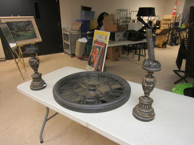 lot 439 image: A MIRROR BACKED WALL CLOCK AND TWO CANDLE HOLDERS