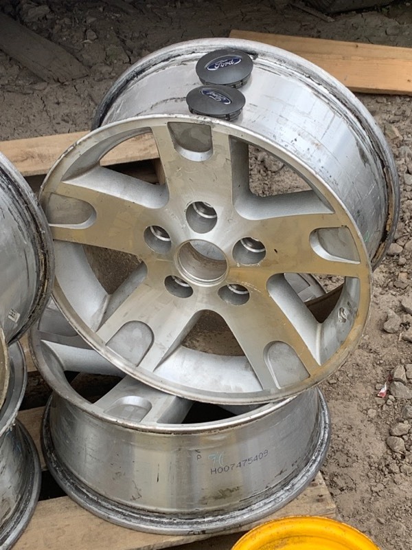 lot 21 image: Ford F.150 Rims, John Deere Gator Rims, Misc Lawn Mower  ATV Rims