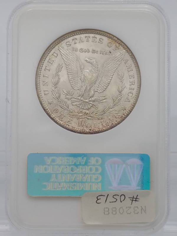 lot 518 image: 1899 O Morgan Silver Dollar - MS63 NGC Toned