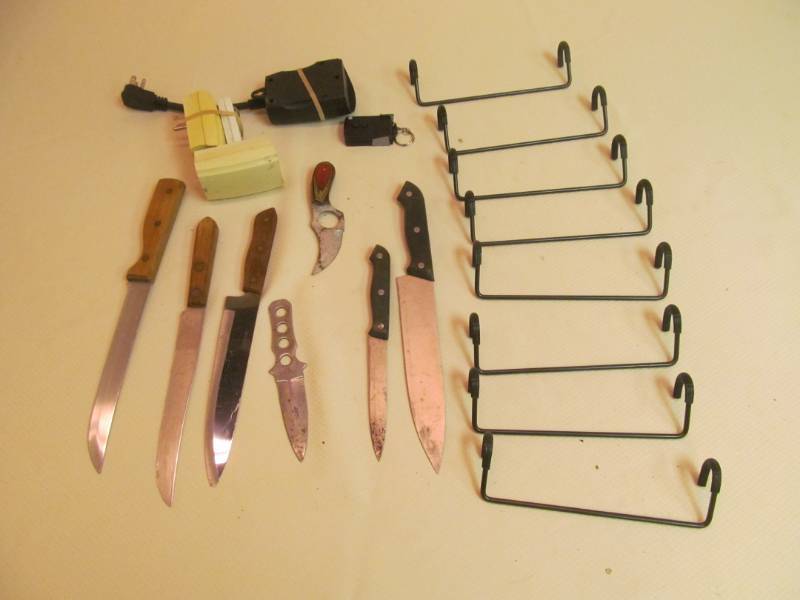 lot 204 image: Group of knifes, display hooks, remote control power strips