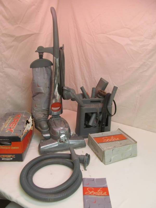 lot 218 image: Kirby vacuum cleaner w many attachments