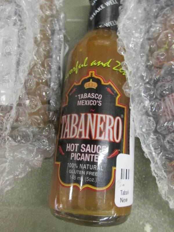 7 Bottles Tabernero Hot sauce...