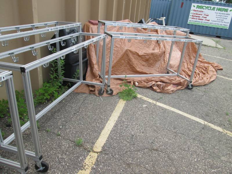 2- 2 Tiered metal racks with hooks ...