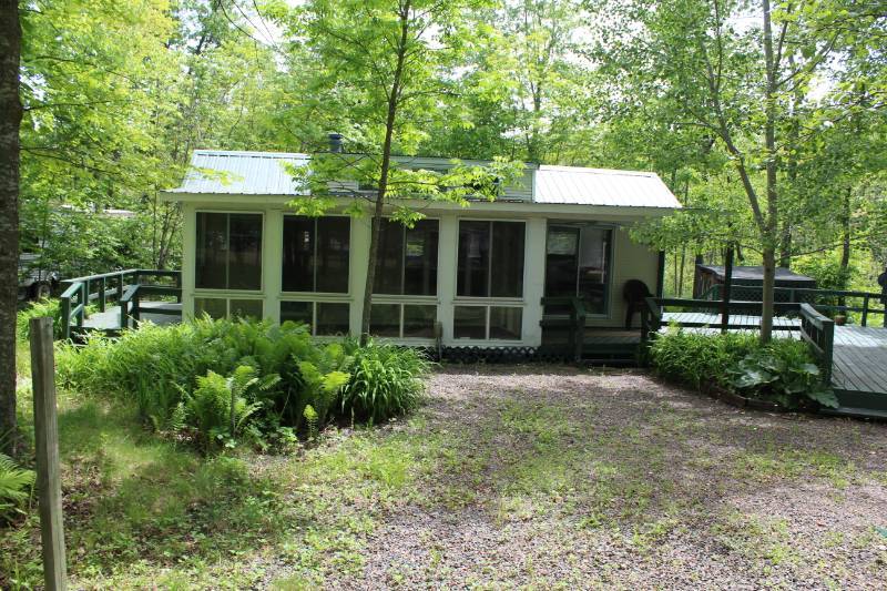 Lake Mille Lacs Vacation Spot with Double Lot and Park Model Home and 1982 15 ft. Starcraft boat with Evinrude 65 hp Outboard Motor