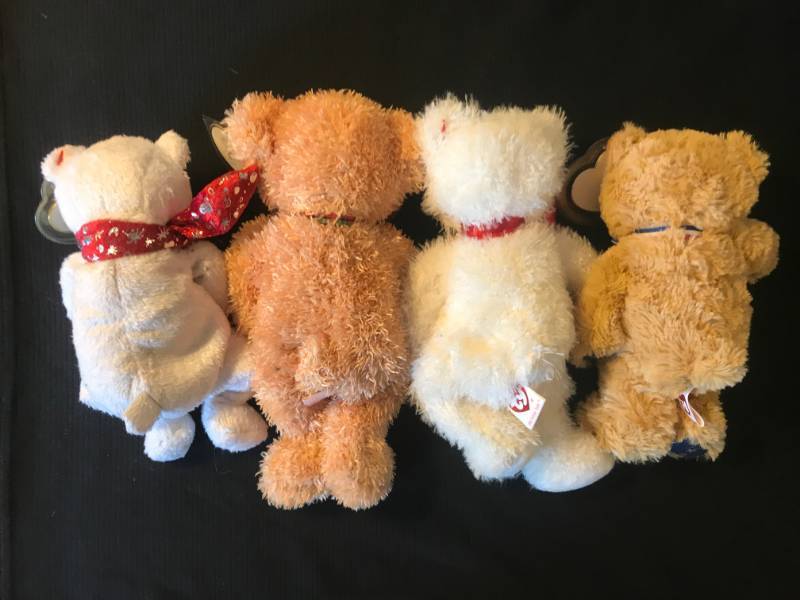 lot 51 image: TY Beanie Babies 2000 Holiday Teddy, Huntley, 2004 Holiday Teddy and Uncle Sam