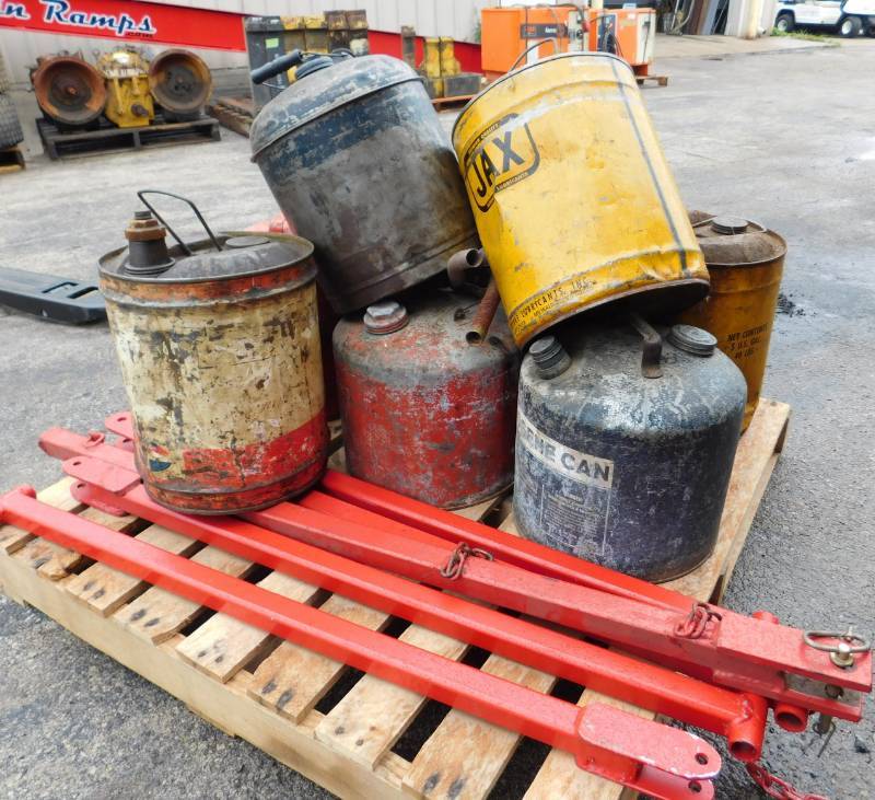 lot 49 image: Used Metal Gas Cans & Handmade Tow Bars
