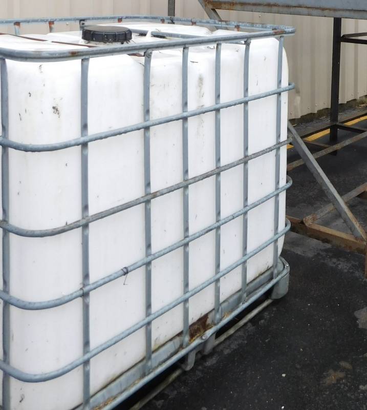 lot 56 image: 275 Gallon Plastic Tote with Spigot