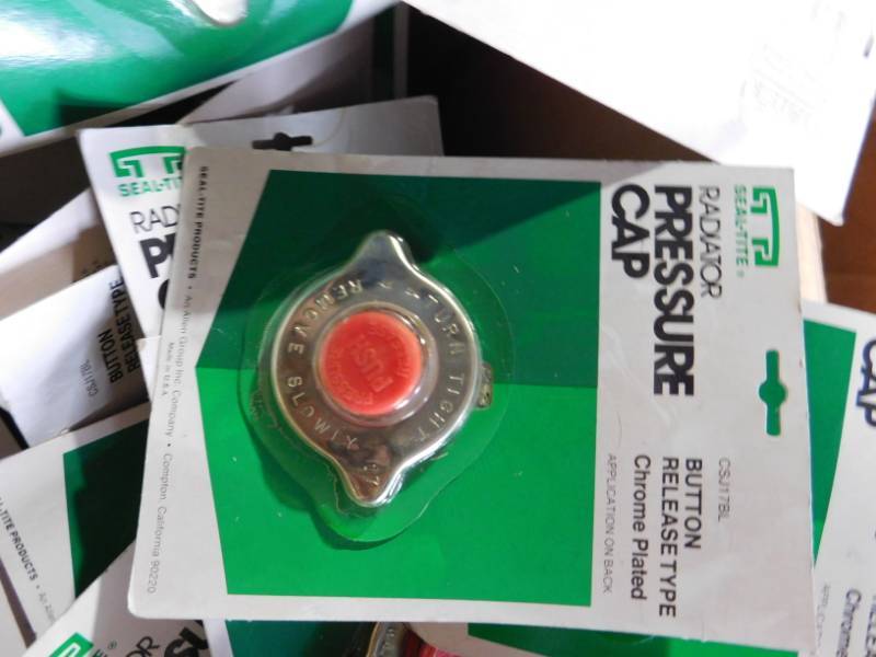 lot 81 image: Large Lot of Sealtight Radiator Caps with Pressure Release Button