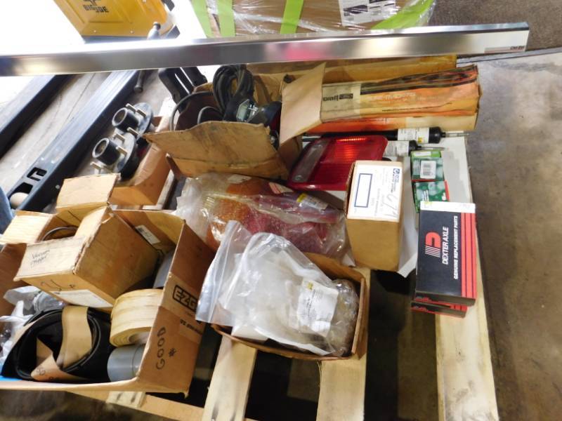 lot 85 image: Shocks, Tail Lights, Tail Gate Protector, Ford Hubcaps, Lincoln Scrubber Parts