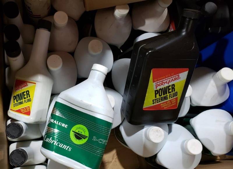 lot 90 image: Large Lot of Moralube 2 Cycle Oil, Power Steering & Brake Fluid, Antifreeze