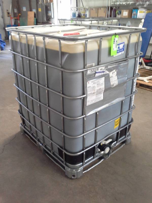 lot 503 image: 330 Gallons of Houghton International Inc. Hocut 797-E Metalworking Fluid - Water Soluble Fluid 330-Gallon Plastic Tank