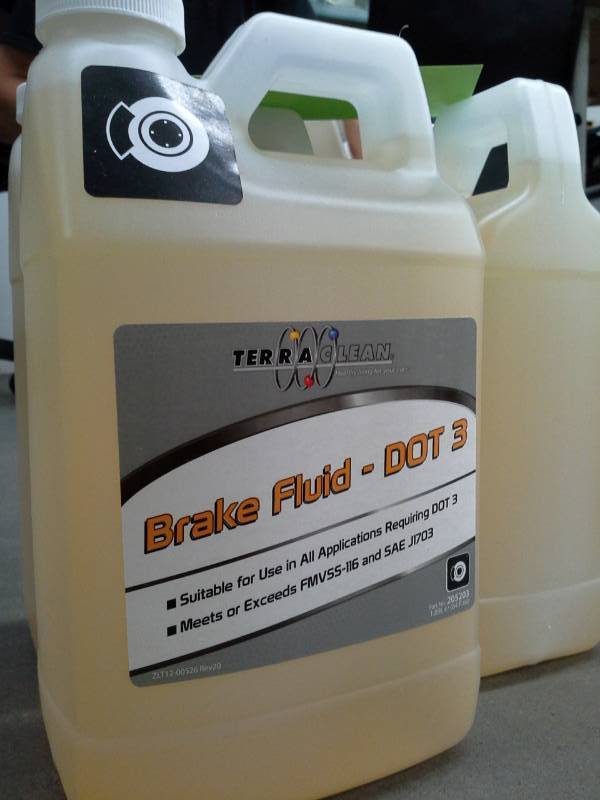 lot 678 image: 3 Bottles of Terra Clean Brake Fluid DOT 3 64oz.