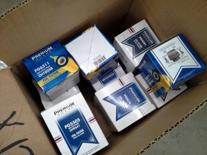 lot 703 image: Premium Guard Oil Filters PG5505,PG6311,PG5610,PG5581,and more