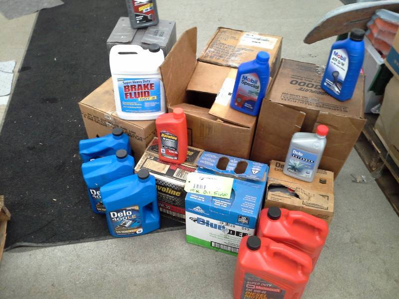 lot 726 image: Miscellaneous Oil, Fluids - Peak Diesel Exhaust, Ford Diesel Oil, Mobil Special, Mobil ATF DM, Delo SAE 15W-40, Havoline 10W-30, And More
