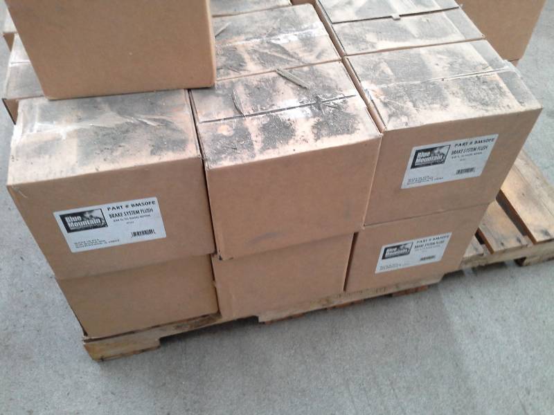 lot 752 image: 6 Cases of Blue Mountain Professional Brake System Flush 64oz.