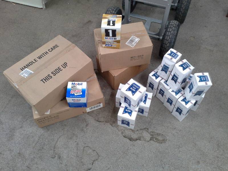 lot 792 image: 4 Cases and 15 of Oil Filters - Mobil M05545, Premuim Guard PG257, Mobil 1 M1-303, Premium Guard PG5598