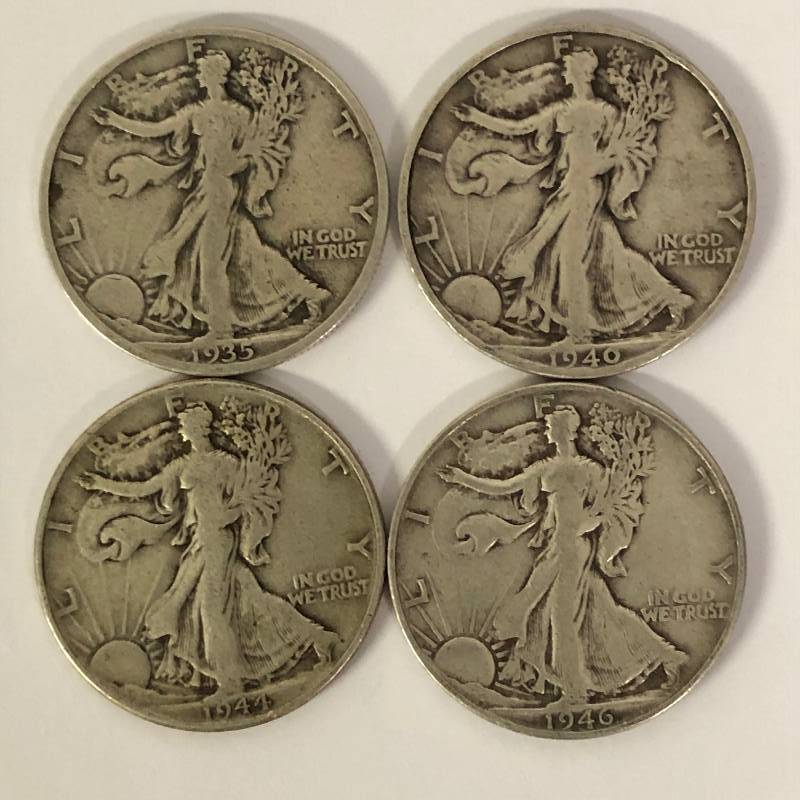lot 79 image: 4 Walking Liberty Halves 1935, 1940-S, 1944, 1946-S