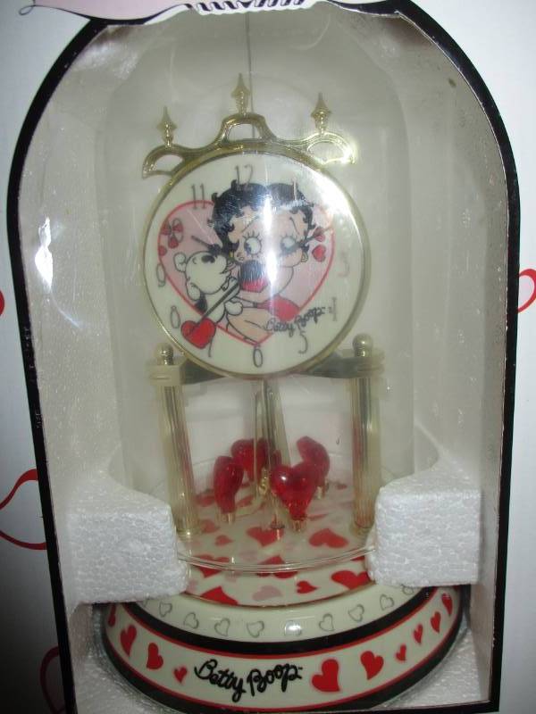 lot 102 image: Betty Boop Porcelain anniversary Collectible Clock, Lunch Box, Matt