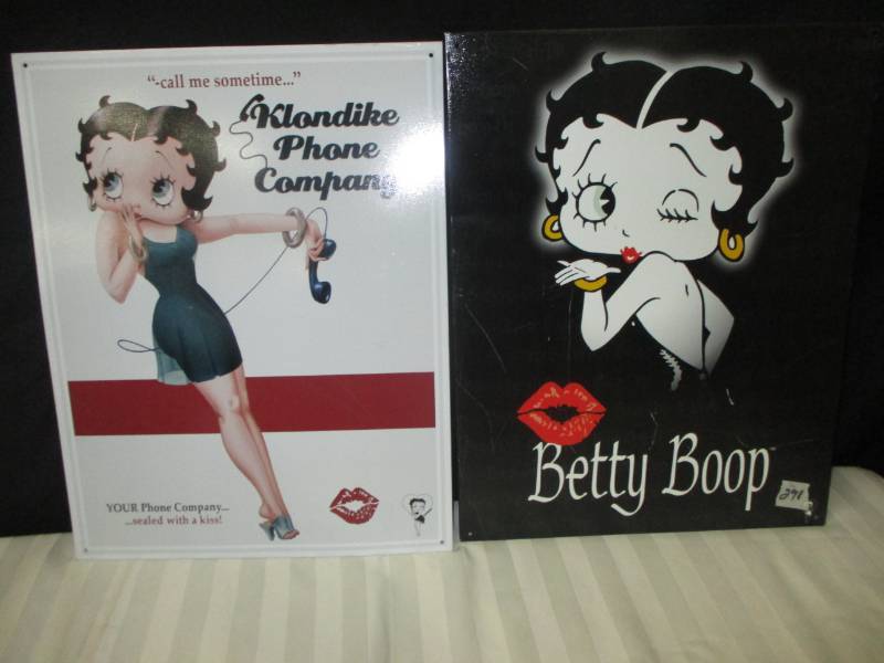 lot 103 image: 2 Metal Betty Boop Signs