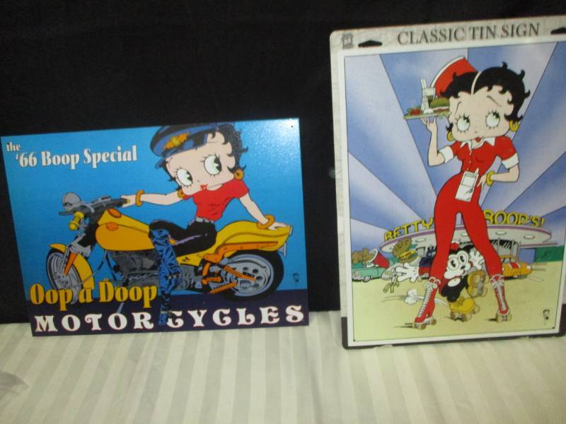 lot 104 image: 2 Metal Betty Boop Signs