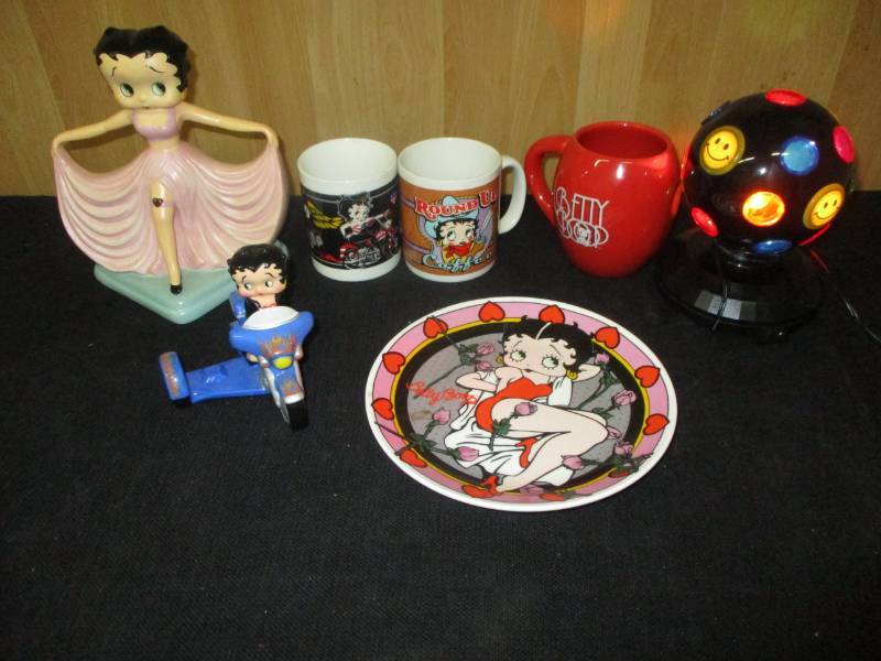 lot 106 image: Betty Boop statue, Coffee Cups, Plate, Motorcycle