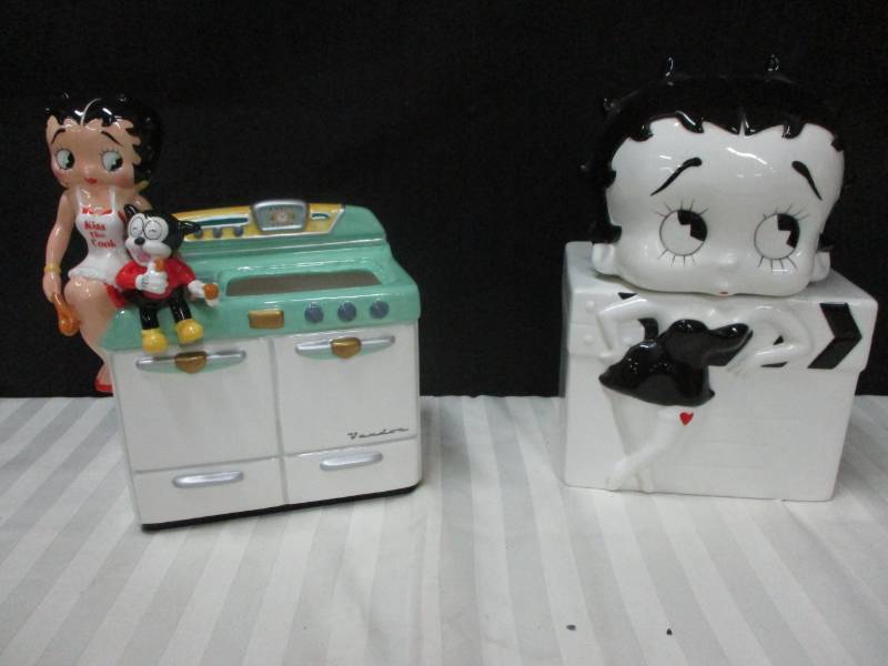 lot 107 image: 2 Betty Boop Cookie Jars (one is missing a cover, would be perfect for utinsels)