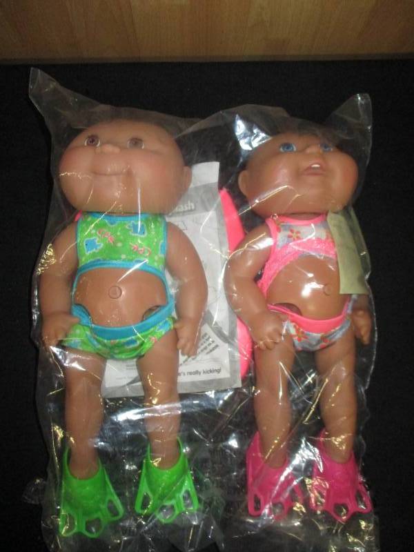 lot 112 image: Kick and Splash Cabbage Splash Kids Dolls with instructions