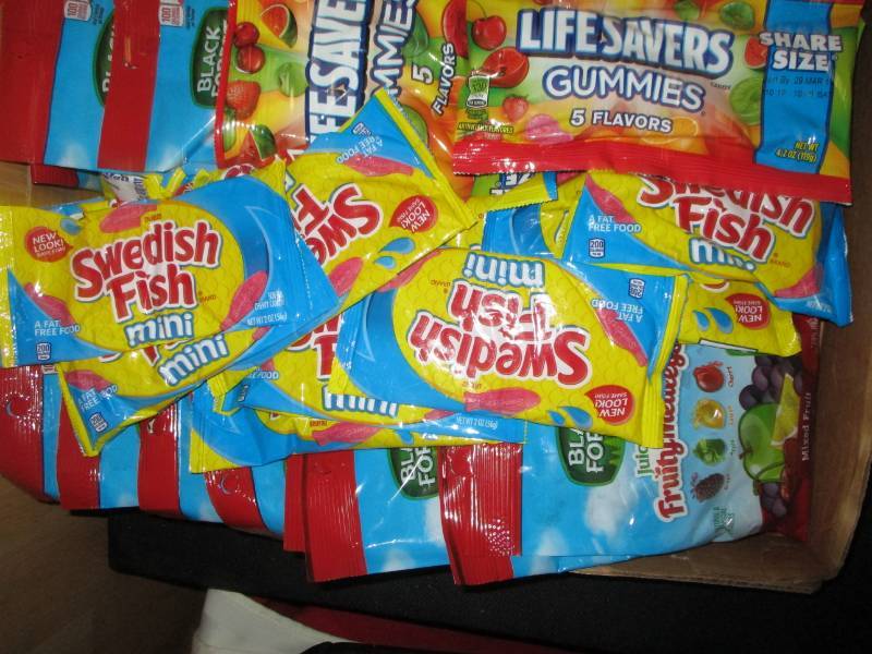 lot 366 image: 32 Bags of sweedish fish, Black Forest gummies and lifesaver snacks