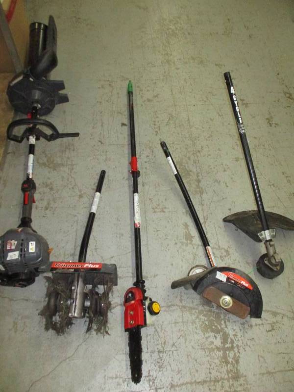 lot 307 image: Troybilt Weedeater with all the attachments