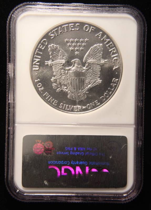 lot 29 image: 1988 AMERICAN SILVER EAGLE 1 TROY OZ. .999 FINE SILVER MS69 NGC