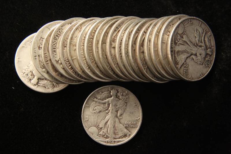 lot 95 image: GROUP OF 20 WALKING LIBERTY SILVER HALF DOLLARS