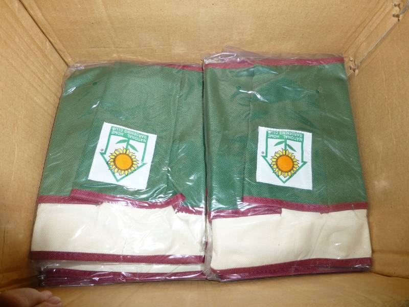 lot 23 image: 60 garden tool aprons...