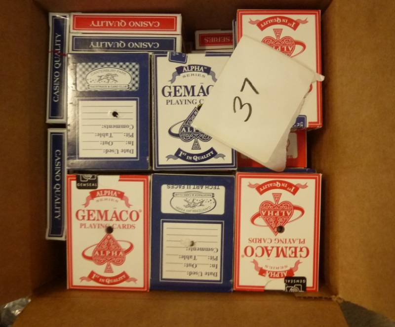 lot 37 image: 58 decks of playing cards...