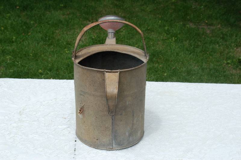 lot 63 image: Cool Rustic Watering Can
