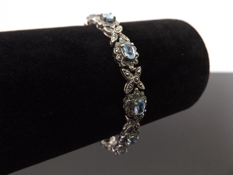 lot 28 image: .925 Sterling Silver Art Nouveau Blue Topaz Bracelet