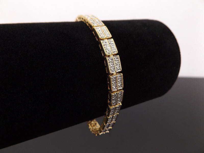 lot 32 image: NEW .925 Sterling Silver Moissanite Accented Vermeil Bracelet