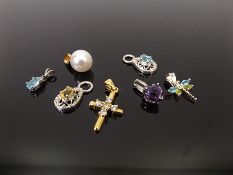 lot 47 image: .925 Sterling Silver Lot of 7 Pendants and Charms
