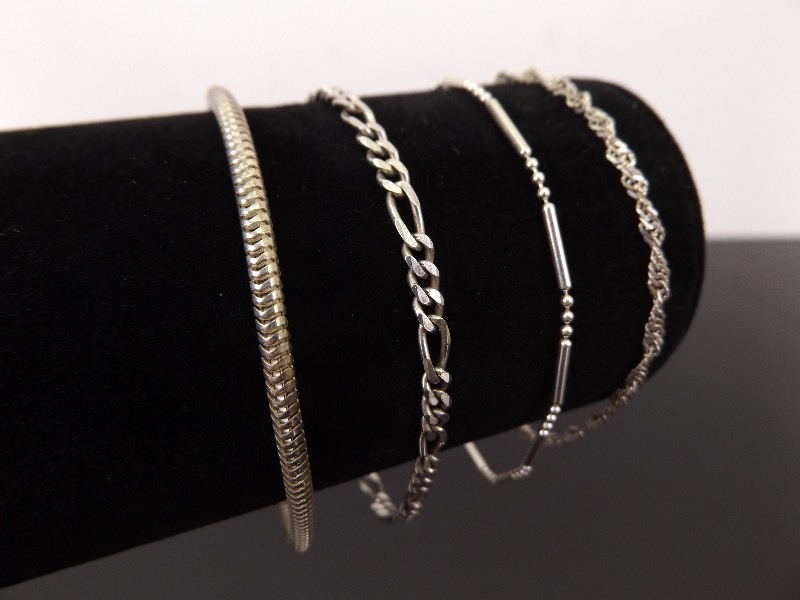 lot 58 image: .925 Sterling Silver Lot of 4 Bracelets, All Size 7.5