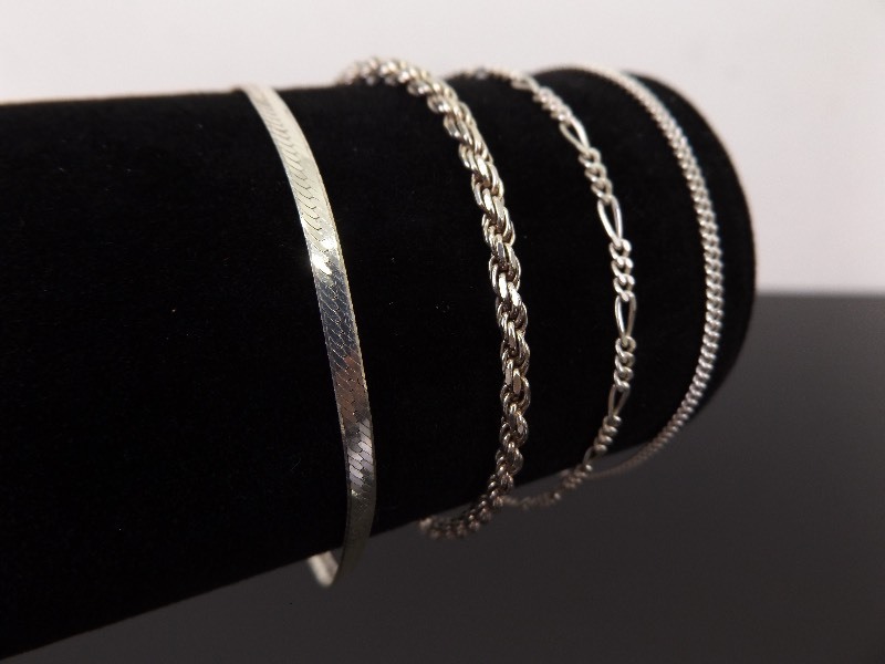 lot 59 image: .925 Sterling Silver Lot of 4 Bracelets, All Size 7
