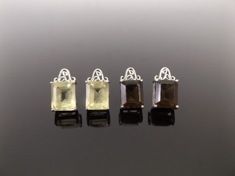 lot 62 image: .925 Sterling Silver Lot of 2 Pairs of Purple and Yellow Crystal Post Earrings