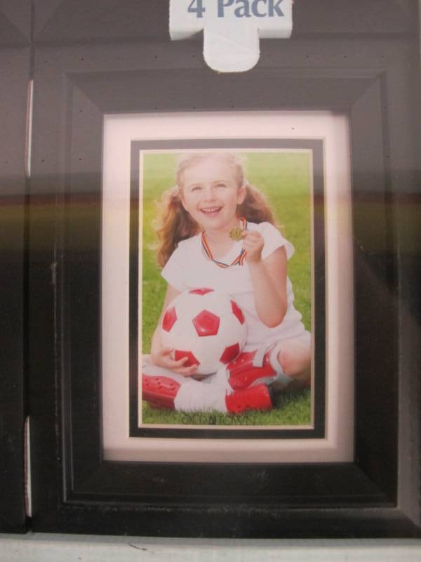 lot 113 image: Old Town 5 in x 7 in Solid Wood Picture Frames with Designer Finish, 4-Pack - Black