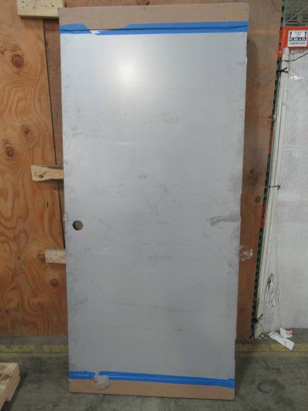 lot 64 image: L.I.F. Industries 36 in. x 80 in. Gray Flush LH or RH Swing Fire Proof Steel Commercial Entrance Door Slab. Single Bore. - Some Scratches