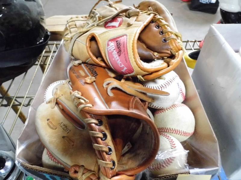 lot 57 image: Baseballs & Gloves