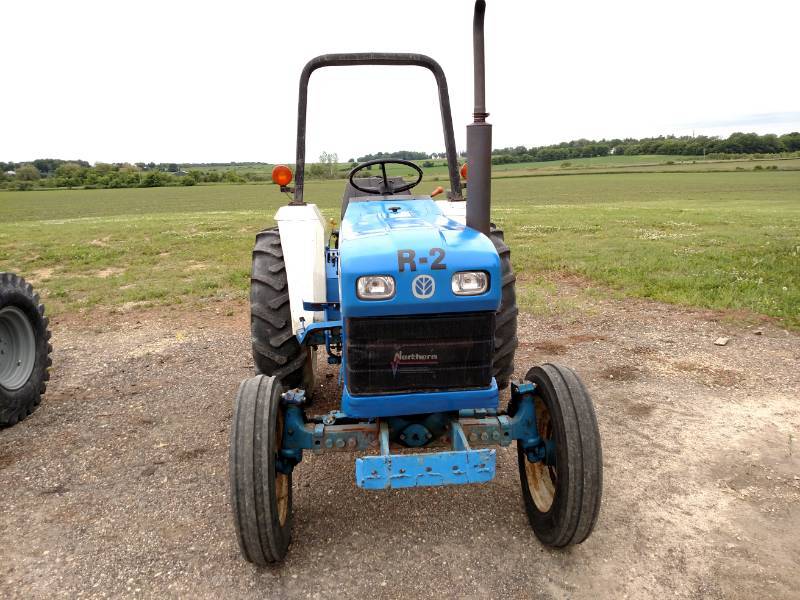 lot 73 image: New Holland Model 1720 Utility Trac...