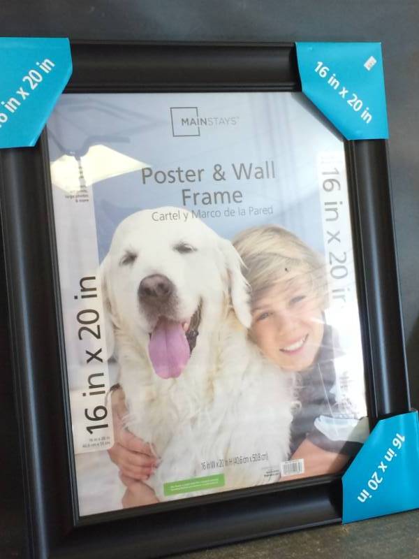 lot 28 image: Poster and Wall Frame